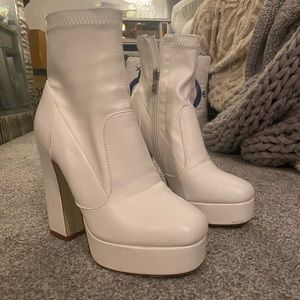White heeled booties